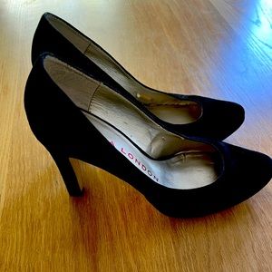 Black suede pumps